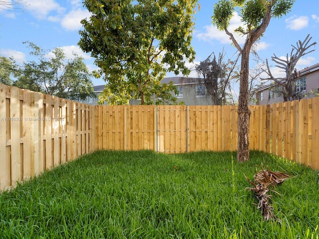 1416 SE 26th Ave, Homestead, FL 33035 - view of yard with a fenced backyard
