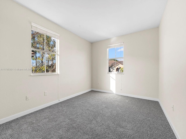1416 SE 26th Ave, Homestead, FL 33035 - carpeted spare room featuring plenty of natural light and baseboards
