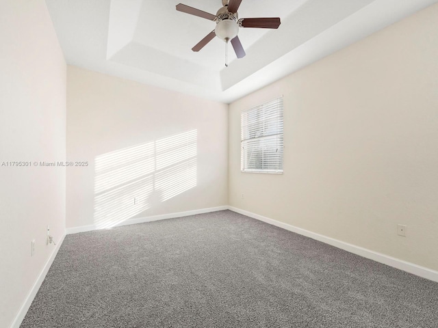 1416 SE 26th Ave, Homestead, FL 33035 - carpeted empty room with baseboards, a ceiling fan, and a raised ceiling