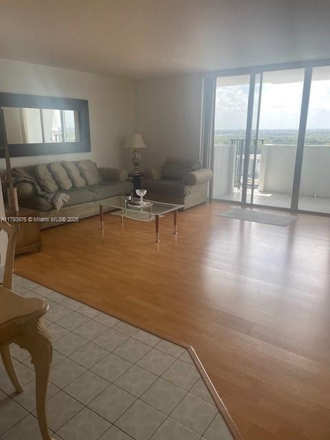 2750 NE 183rd St Unit 2604, Aventura, FL 33160 - living room featuring plenty of natural light and light tile patterned floors