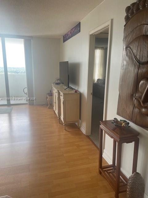 2750 NE 183rd St Unit 2604, Aventura, FL 33160 - living room with light wood finished floors