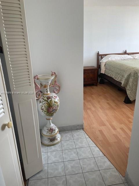 2750 NE 183rd St Unit 2604, Aventura, FL 33160 - bedroom with light tile patterned floors