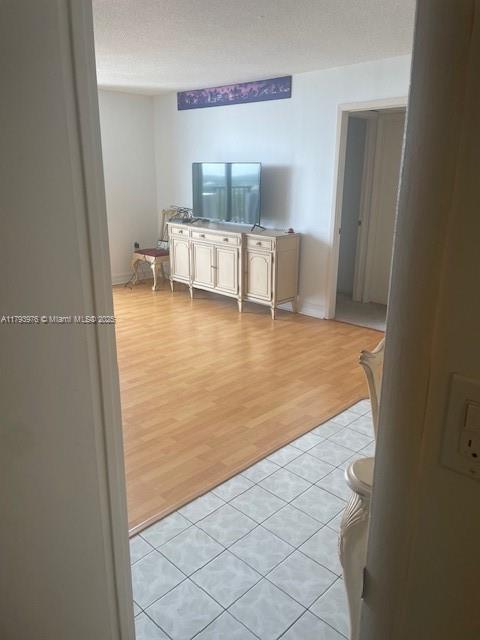 2750 NE 183rd St Unit 2604, Aventura, FL 33160 - living room featuring light wood finished floors