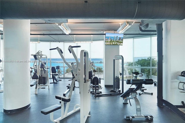 2101 Brickell Ave Unit 3208, Miami, FL 33129 - exercise room with plenty of natural light and a wall of windows