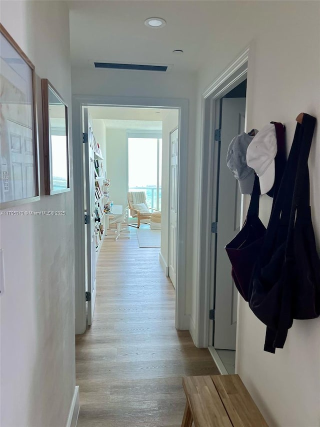 2101 Brickell Ave Unit 3208, Miami, FL 33129 - corridor featuring recessed lighting, baseboards, and light wood finished floors