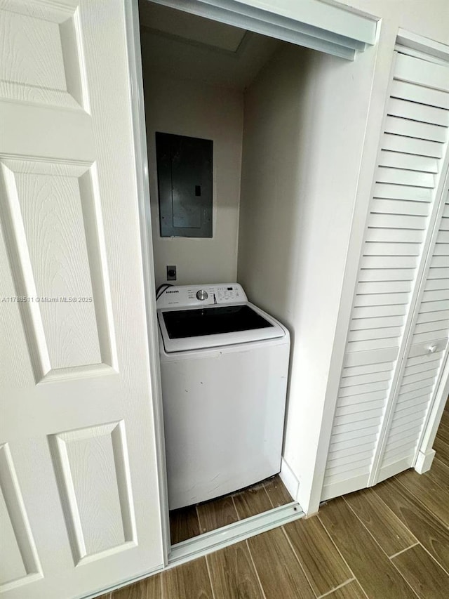 1770 NW 109th St, Miami, FL 33167 - clothes washing area with laundry area, washer / clothes dryer, wood finished floors, and electric panel