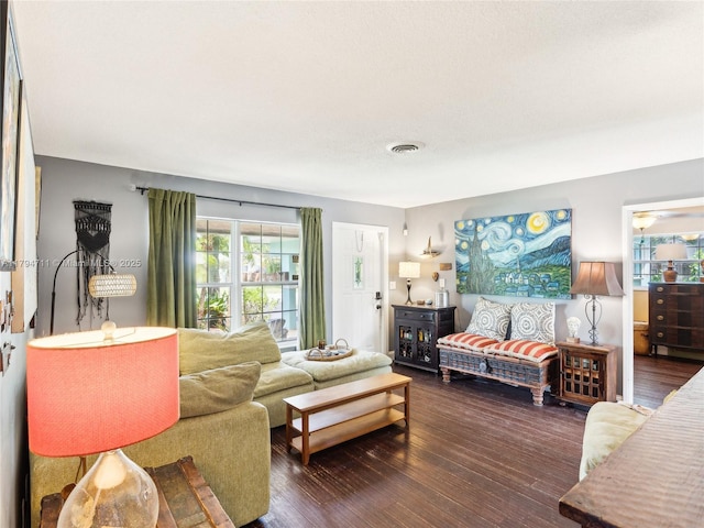4400 NE 13th Ave, Oakland Park, FL 33334 - living room featuring visible vents and wood finished floors