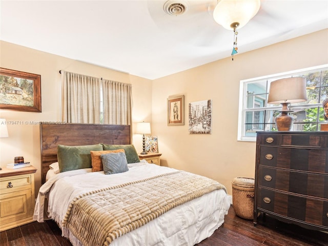 4400 NE 13th Ave, Oakland Park, FL 33334 - bedroom featuring visible vents, baseboards, and dark wood-style floors