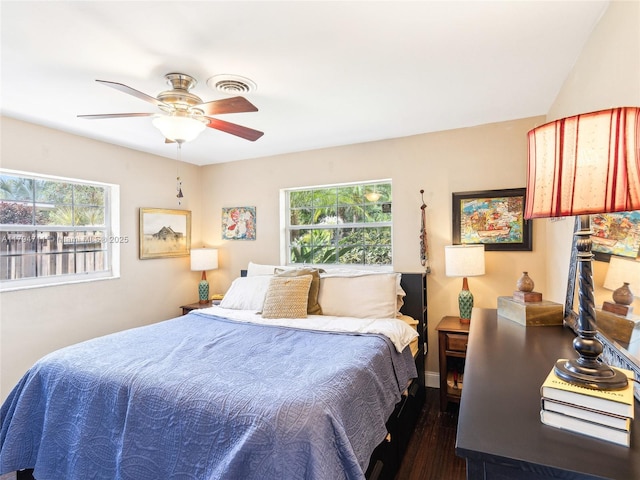 4400 NE 13th Ave, Oakland Park, FL 33334 - bedroom featuring a ceiling fan, multiple windows, visible vents, and wood finished floors