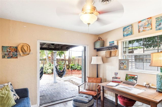 4400 NE 13th Ave, Oakland Park, FL 33334 - home office featuring a ceiling fan, baseboards, visible vents, and wood finished floors