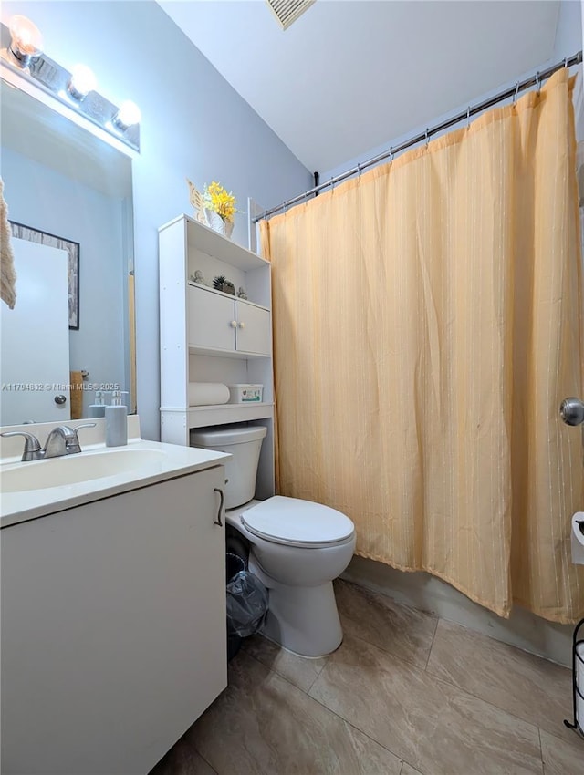 full bath with vanity and toilet