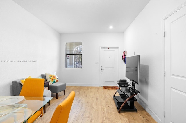 sitting room featuring light wood-style floors, recessed lighting, and baseboards