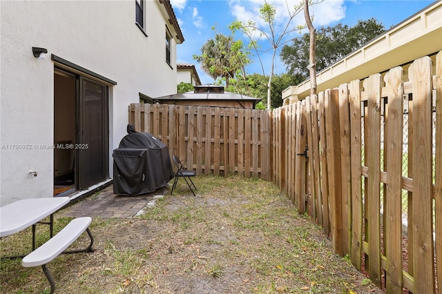 view of yard featuring a fenced backyard