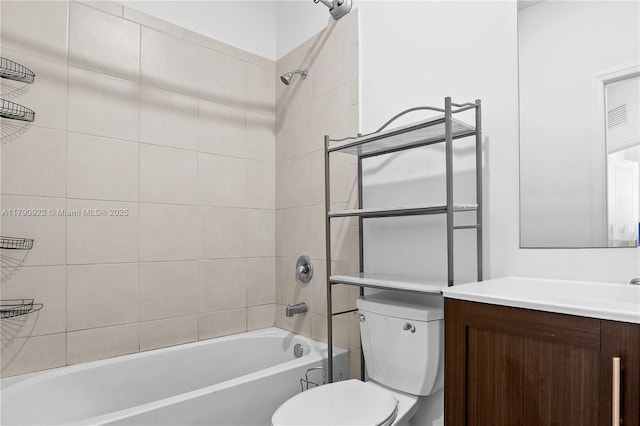 bathroom featuring shower / bathtub combination, toilet, visible vents, and vanity