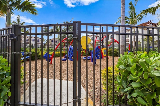 view of gate featuring fence