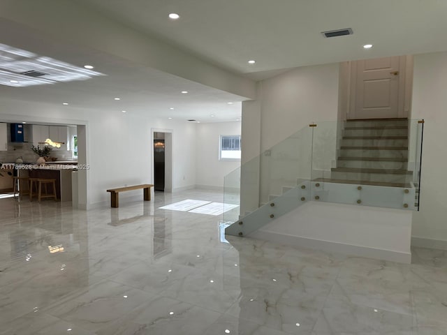 360 NE 118th St, Miami, FL 33161 - staircase featuring recessed lighting, baseboards, visible vents, and marble finish floor