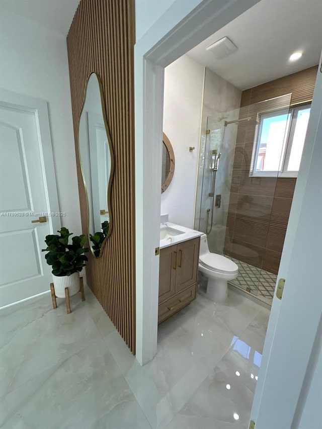 360 NE 118th St, Miami, FL 33161 - bathroom with toilet, a shower stall, marble finish floor, and vanity