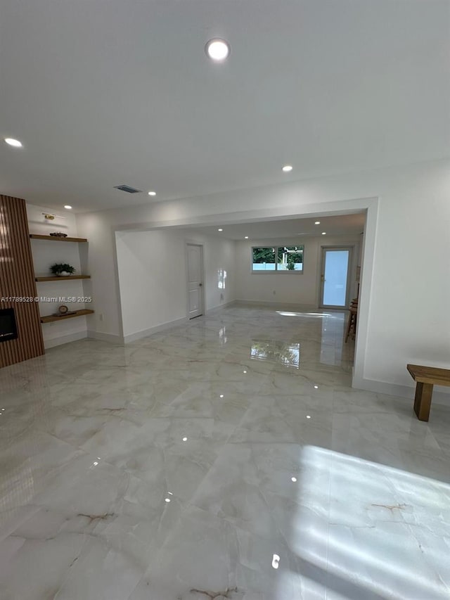 360 NE 118th St, Miami, FL 33161 - unfurnished living room featuring recessed lighting, baseboards, visible vents, and marble finish floor