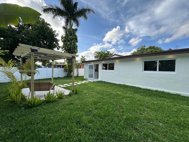 360 NE 118th St, Miami, FL 33161 - view of yard featuring a pergola, fence, and a patio area