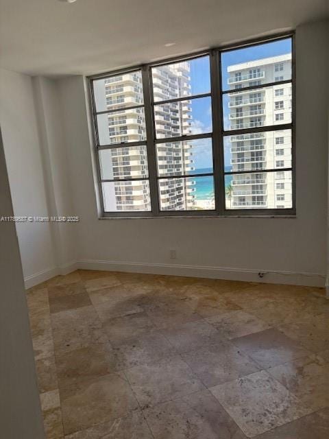 empty room with baseboards