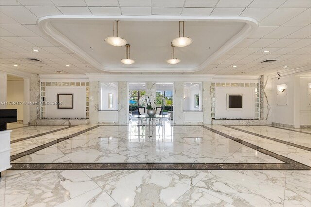 5700 Collins Ave Unit 10D, Miami Beach, FL 33140 - community lobby featuring crown molding and recessed lighting