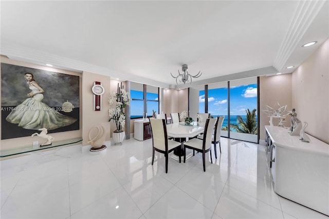 9801 Collins Ave Unit 6A, Oceanfront, Bal Harbour, FL 33154 - dining room featuring a wall of windows, a chandelier, and light tile patterned flooring