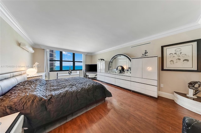 9801 Collins Ave Unit 6A, Oceanfront, Bal Harbour, FL 33154 - bedroom featuring ornamental molding, wood finished floors, and baseboards