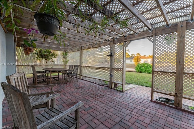 view of patio / terrace featuring outdoor dining area and a pergola