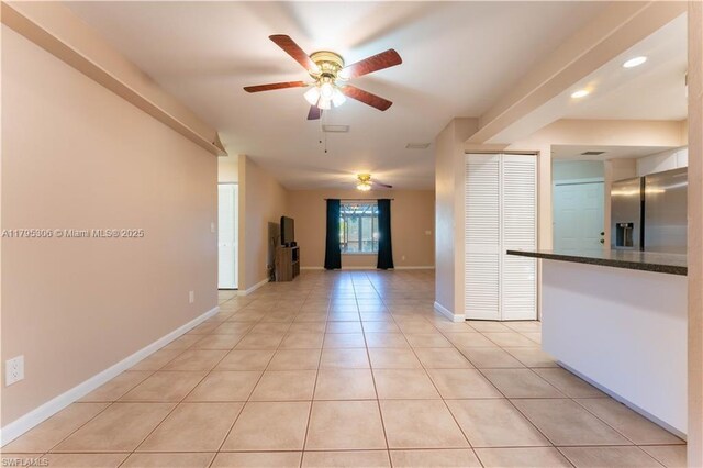 3054 NE Beechwood Cir, La Belle, FL 33935 - spare room featuring baseboards, a ceiling fan, light tile patterned floors, and recessed lighting