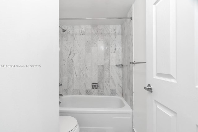 bathroom featuring toilet and shower / washtub combination