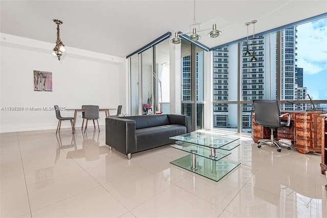 living room with tile patterned flooring, floor to ceiling windows, and baseboards