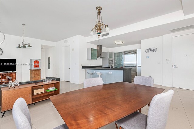 18201 Collins Ave Unit 3405, Sunny Isles Beach, FL 33160 - dining space featuring electric panel, light tile patterned flooring, and visible vents