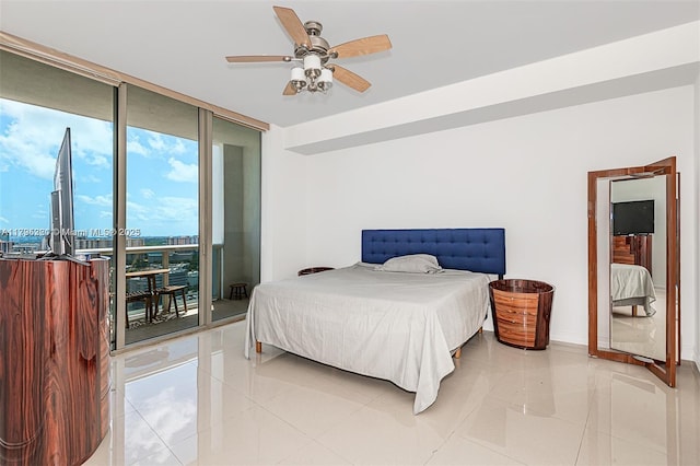 bedroom featuring access to outside, a ceiling fan, floor to ceiling windows, and light tile patterned floors