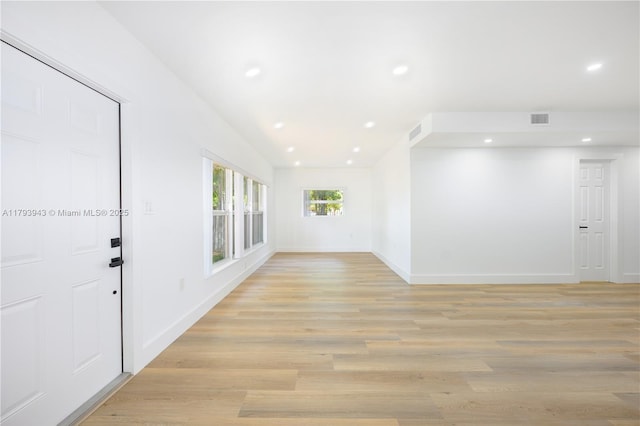 736 NE 164th St, Miami, FL 33162 - unfurnished room with baseboards, recessed lighting, and light wood-type flooring
