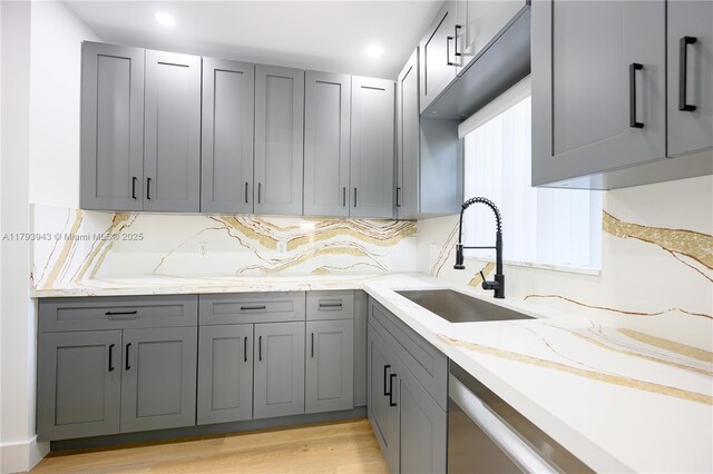 736 NE 164th St, Miami, FL 33162 - kitchen with a sink, gray cabinets, light stone counters, tasteful backsplash, and recessed lighting