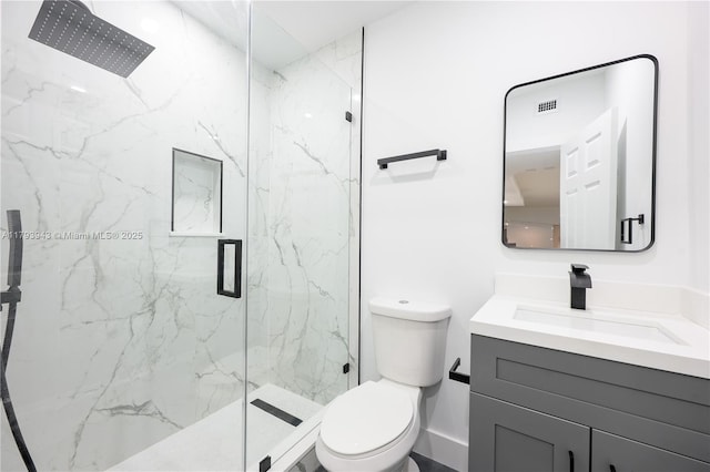 736 NE 164th St, Miami, FL 33162 - full bathroom with vanity, a marble finish shower, and toilet