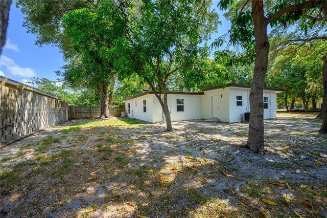 736 NE 164th St, Miami, FL 33162 - fenced backyard with cooling unit