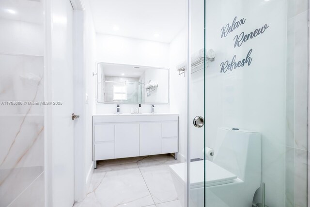 14354 SW 113th Ter, Miami, FL 33186 - bathroom featuring vanity, a stall shower, and marble finish floor