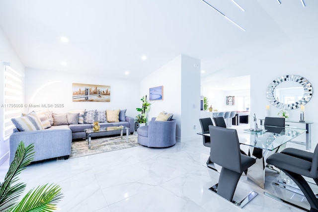 living room with recessed lighting and marble finish floor