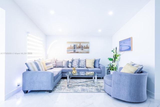 living room with baseboards, recessed lighting, and marble finish floor