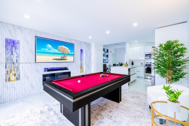 playroom with recessed lighting, marble finish floor, pool table, and a fireplace