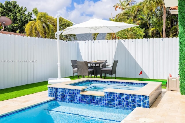 view of swimming pool with a fenced backyard, outdoor dining area, and a pool with connected hot tub