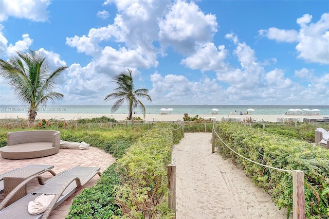 property view of water with a beach view