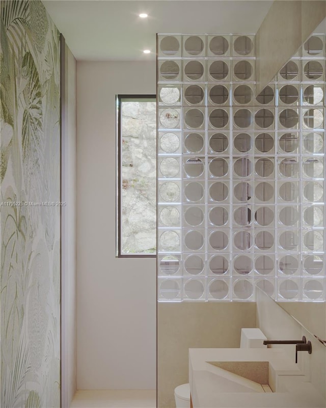 bathroom featuring toilet
