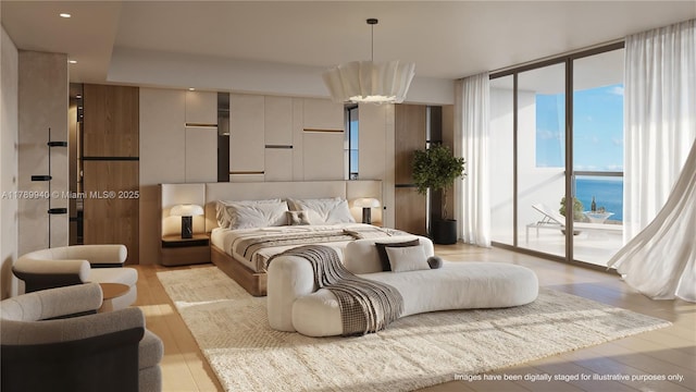 bedroom with recessed lighting, a wall of windows, access to exterior, and light wood-style flooring