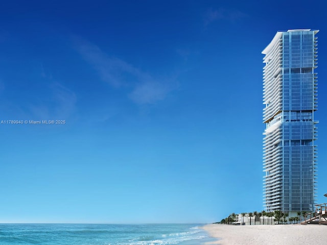 view of water feature with a beach view