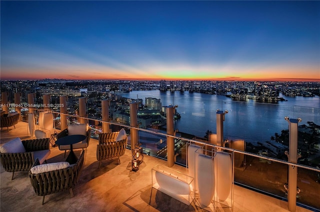 exterior space featuring a view of city and a water view