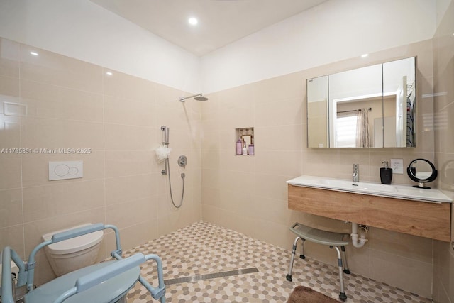 full bathroom featuring toilet, tile walls, and a tile shower