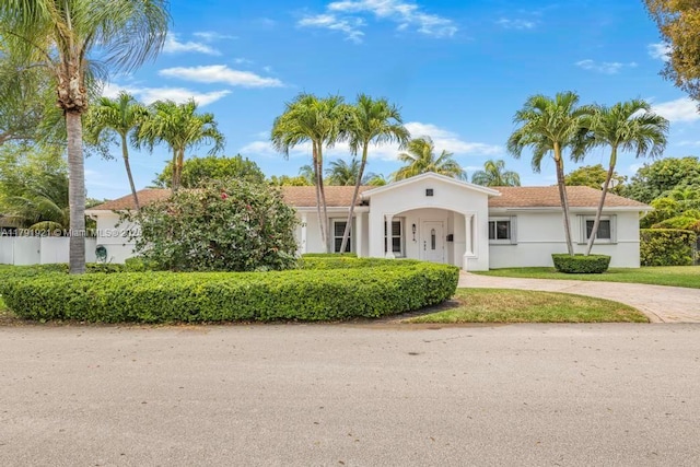 8241 SW 146th St, Palmetto Bay, FL 33158 - mediterranean / spanish house featuring fence and stucco siding