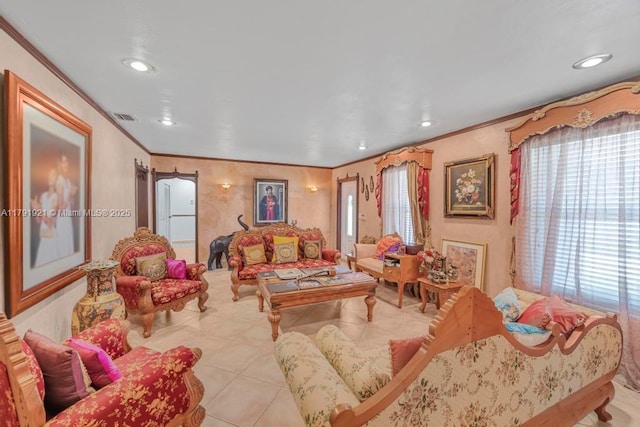tiled living area featuring visible vents, ornamental molding, and a wealth of natural light